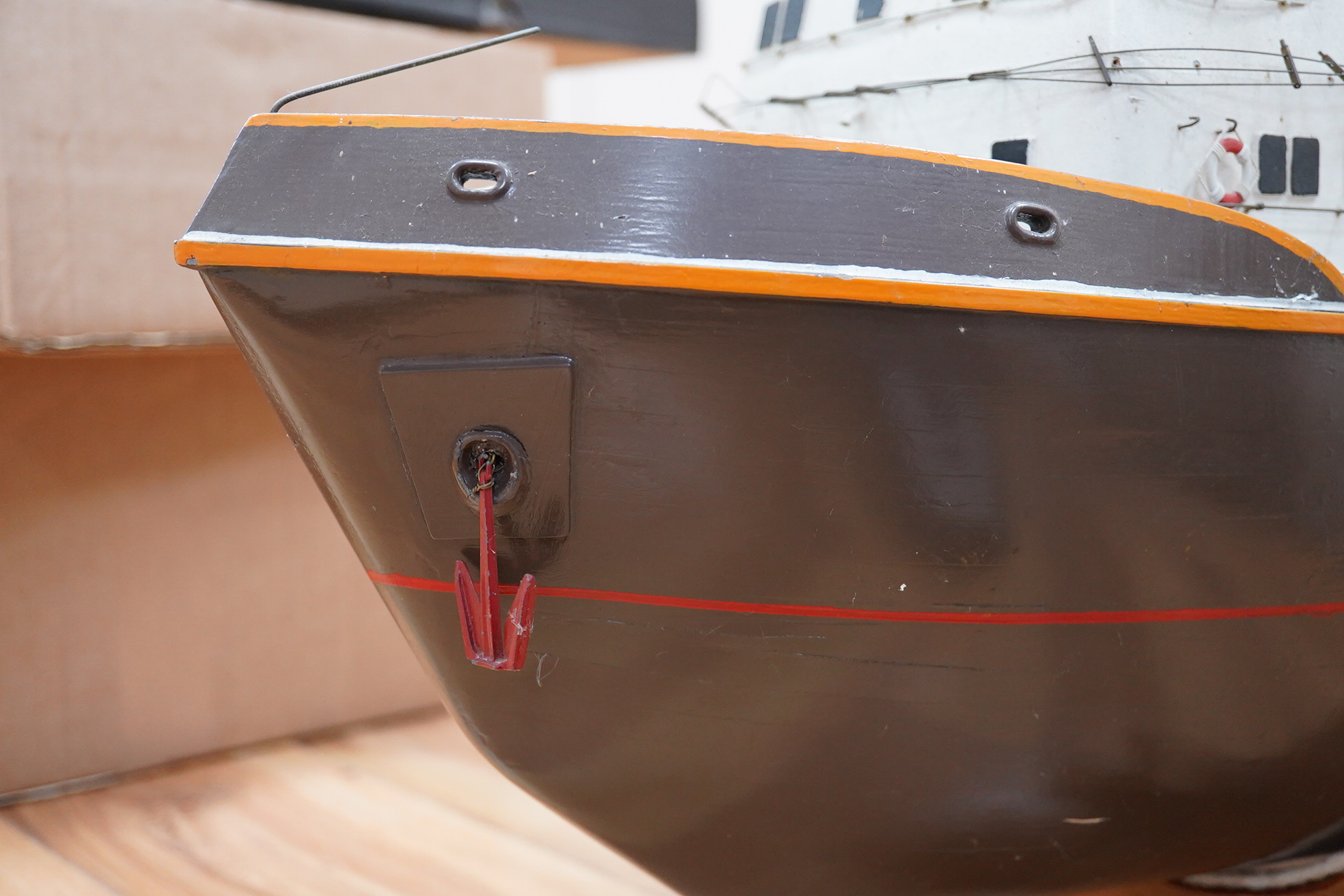 A model of the tugboat Amsterdam, probably built from a kit as a pond yacht, and powered by an electric motor, length of hull approx 103cm, of primarily painted wood construction